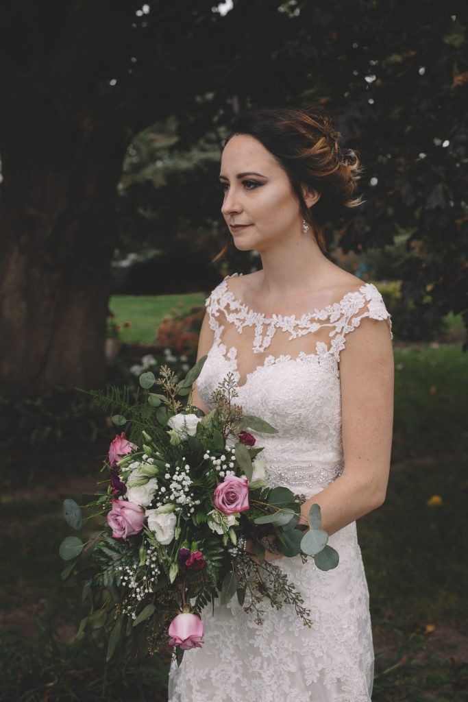 Jewel toned, October wedding with airy, greens and roses bouquets photographed at Barn on the Hill in Leaf River, Illinois by Sara Anne Johnson. 