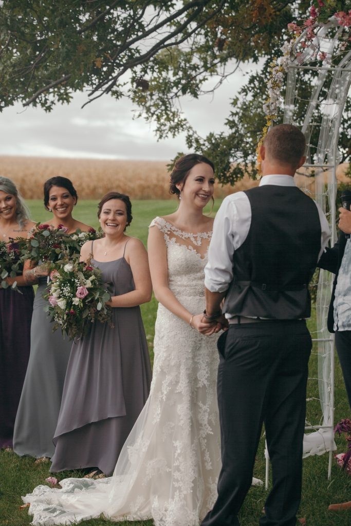 Jewel toned, October wedding with airy, greens and roses bouquets photographed at Barn on the Hill in Leaf River, Illinois by Sara Anne Johnson. 