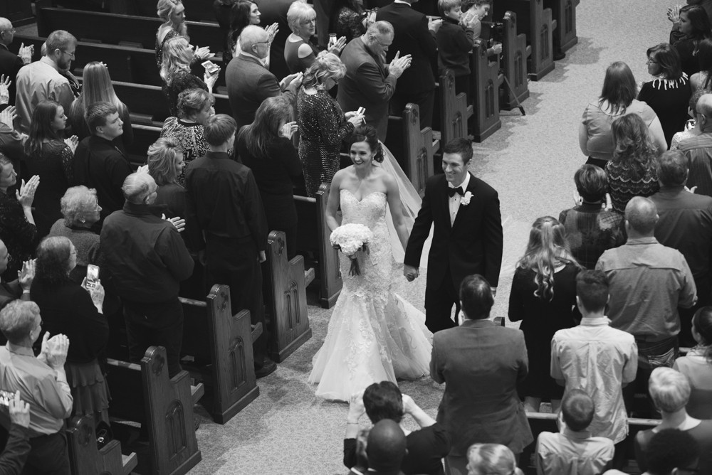 Gold glam winter New Year's Eve wedding in Decorah, Iowa photographed by Sara Anne Johnson