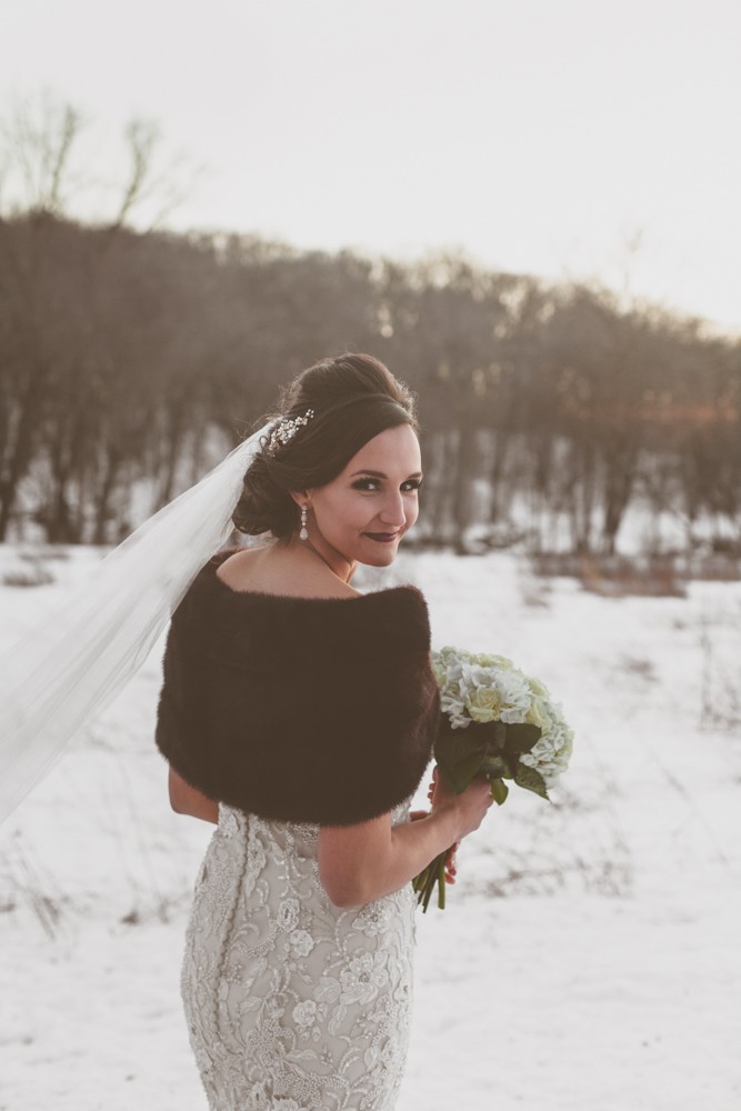 Gold glam winter New Year's Eve wedding in Decorah, Iowa photographed by Sara Anne Johnson