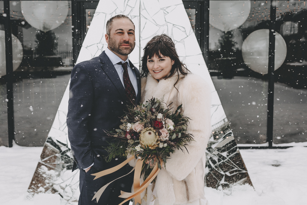 Winter rooftop wedding downtown Rockford at The Standard with fruit filled florals and rich, jewel tones - Featured on Wedding Chicks - by Sara Anne Johnson