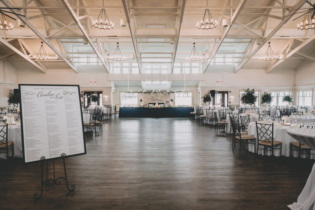Navy and lemon spring wedding with hanging head table florals at Rockford Bank and Trust Pavilion by Sara Anne Johnson