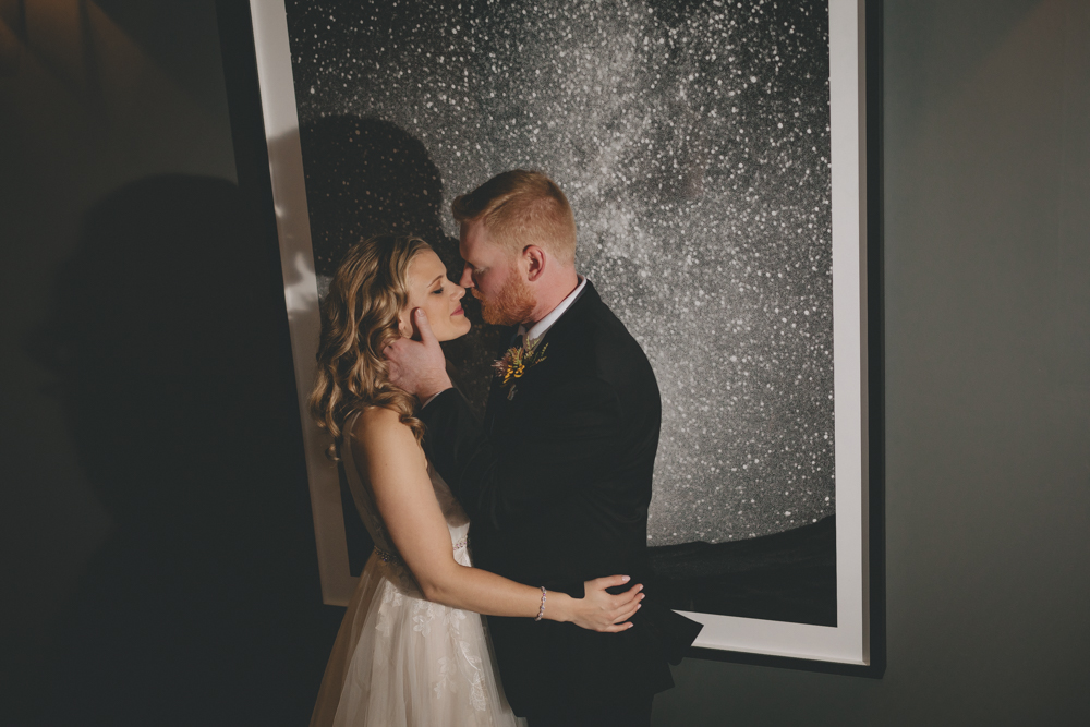 Rainy, urban, rooftop October wedding in downtown Rockford, IL at The Standard with London Avenue, blue suede wedding heels, and a wild flower bouquet - Sara Anne Johnson - Photographer