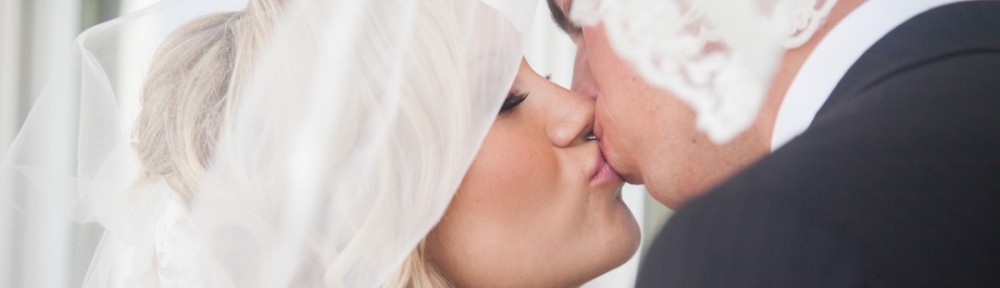 Naperville wedding, bride and groom share a kiss under the veil | Rockford, Illinois Wedding Photographer Sara Anne Johnson