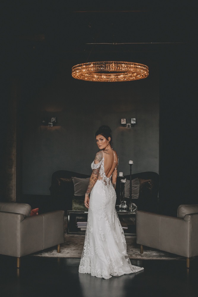 Chic, urban, rooftop summer wedding in downtown Rockford, IL at The Standard with London Avenue, Arch Apothecary, and gold, black, and green accents - Sara Anne Johnson - Photographer
